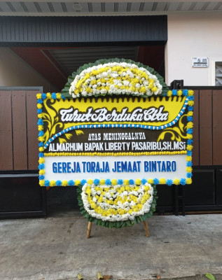 Papan Bunga Duka di Ibu